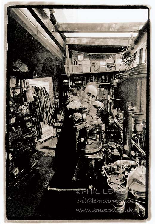 Mechanic in tiny workshop, Phil Lemon
