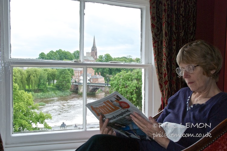 Woman reading, hotel room, Chester, Phil Lemon