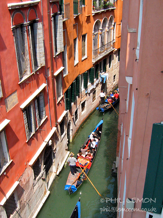 Venice canal with two full gondolas, Phil Lemon