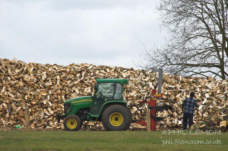 Tractor by a woodpile, Wimbledon Common, Phil Lemon